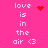 Pixelated text 'love is in the air <3' on bright pink background with red heart and starburst symbols.