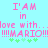 Pixelated text on light blue background reads 'I'AM in love with...love with... !!!!MARIO!!!!!' with green plus signs below.
