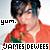 Pixelated static image of a person with dark hair wearing red clothing, featuring text 'yum.' and 'JAMES DEWEES' in black block letters.