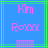 Pixelated pink text 'Km' above 'Roxx' on blue background with green lines and a striped rectangle at bottom