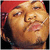 Pixelated image of a person with red headwear and light skin, next to bold red text reading 'Game is Lame' on black background.