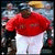 A pixelated image shows a person in red and white clothing on the left, with bold red text reading "BIG PAPI IS MY DADDY!" on a blue background to the right.