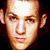 A pixelated image of a person's face with visible text 'Bael' in the lower right corner, showing slight variations across frames.