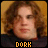 Two side-by-side pixelated images of a person with curly brown hair against a yellow background, each with text below.
