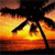 A pixelated image shows a stylized figure in a dynamic pose against a gradient background of orange and yellow hues.