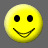 Two yellow circular faces with black eyes and smiling mouths against a gray background; one face has both eyes open, the other winks with a horizontal line for the closed eye.
