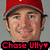 Pixelated image of a person wearing a red cap and dark hair, with red text reading "Chase Ulyss" at the bottom.