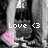 Pixelated grayscale image with pink heart and white text 'Love <3' overlaid on dark background.