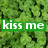Green leafy background with two green rectangular text boxes containing white text reading 'kiss me' and 'im irish' on the top