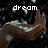 A pixelated image of a hand with text overlays reading 'dream', 'come', and 'true' against a dark background.
