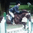 Pixelated image of a person riding a horse in a dynamic pose with green background and white foreground elements.