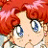 Pixelated anime-style character with red hair and blue eyes, next to black background with white text "Anime IM" and "c0m".