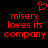 Red pixelated text on black background reads 'misery loves its company' with a red heart symbol above the text.
