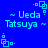 Blue background with light blue pixelated text and symbols arranged in a pattern, featuring repeated names and decorative elements