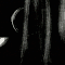 Black-and-white animated sequence showing a woman's profile transitioning to full face, then shifting to different poses against a water background.