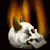 Pixelated skull with brown horns and black eye sockets, set against a backdrop of orange and yellow flames, displayed in a