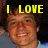 A pixelated image of a person with dark hair wearing a light blue shirt, with yellow text reading "I LOVE JOSH BUTCHERSO" across the top and middle sections.