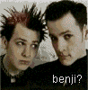 nine pixelated showing two people with spiky hair, one with red-tipped spikes and the other dark-haired, in a sequence of text-based interactions
