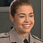 A 48x48 pixel buddy icon featuring a person in military uniform on the left and green text reading "Original Icons .com" on a dark background to the right.