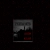 A dark, pixelated square icon with a central rectangular shape containing faint light gray and red elements against black background.