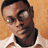 A 48x48 pixel buddy icon featuring a person in the top-left quadrant with text "Wayne Wonder" on the right and "No Holding Back" below, all set against an orange background with gray transparency in the bottom-right quadrant.