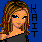 Pixelated icon of a person with long brown hair and blue eyes, wearing dark clothing against a solid blue background.