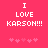 Pixelated text on a solid pink background with two of small hearts below the text