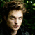A pixelated image of a person with brown hair against dark green foliage, featuring pink text reading "I Love Edward Cullen!!" on the right side.