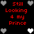 Red text 'Still Looking 4 my Prince' on black background with alternating gray and white heart icons in a pattern