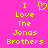 Pixelated yellow text on bright pink background reads "I Love The Jonas Brothers" with a heart symbol replacing the 'O' in Love.