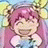 Pixelated anime-style character with pink hair and closed eyes smiling, next to black background with white text reading 'Anime IM' and 'c0m'