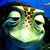 Pixelated close-up of a cartoon fish with large eyes and greenish-yellow body against dark blue background.