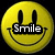 Four yellow smiley face icons arranged in a on a black background, each with distinct text or symbol overlays