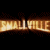 A 2x2 contact sheet of a pixelated animated icon featuring Superman from Smallville, showing three frames with visible text and character poses against dark backgrounds.