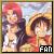 Pixelated image of two anime-style characters with pink and brown hair, one holding a white object, against a light background with 'FAN' text in the corner.