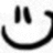 Black and white smiley face icon with two vertical eyes and curved mouth, showing slight pixel blur in top-right quadrant.