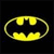 Yellow Batman symbol on black background with adjacent yellow text blocks containing red pixelated letters.