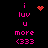 Pixelated pink text and symbols on black background with animated heart and starburst effects.