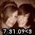 Pixelated image of two figures in a close embrace with dark hair against a brown background, displaying time text at the bottom.