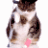 A pixelated cat with brown and white fur stands against a white background, while green text on the right reads 'Original Icons .com' in stylized font.