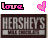 Pixelated pink 'love' text and heart icons above two identical Hershey's chocolate bar images with visible pixelation.
