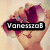 A pixelated image of a woman's face with a purple flower covering her eyes, overlaid with the text 'VanessaE' in a black bar.