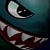 Pixelated close-up of a creature's eye and mouth with dark teal background, showing white sclera, black pupil, and sharp teeth.