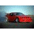 Red sports car with dark roof and silver wheels on road under light blue sky, green text 'Original Icons .com' on right side.