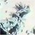 Pixelated static image with indistinct shapes in muted tones of gray, white, and faint green against a light background.