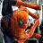 Animated Spider-Man icon with orange webbed suit, black mask, and white eyes; red 'SPIDER MAN' text on right side.