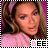 A person with light brown hair and a pink headband wears a pink top against a purple background, with 'BEE' text below.