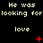 Black background with repeated text 'He was looking for love' in light yellow pixelated font, featuring red plus and X symbols that change position across frames.