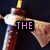 A pixelated image of a figure holding an object with text overlays in different colors across sections.