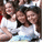 Group of people in casual clothing with green text overlay reading 'CLC 2007' on the right side of the image.